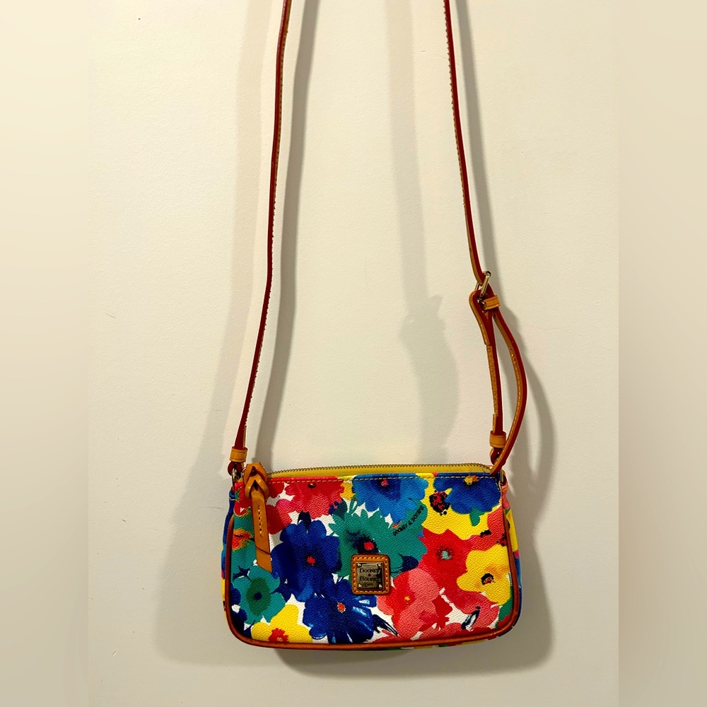 Brand new Dooney and Bourke floral crossbody.